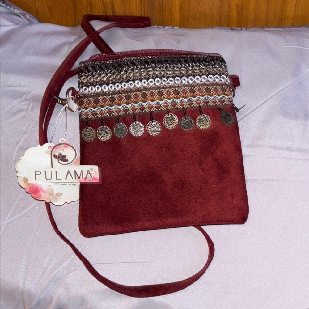 Red Suede Crossbody Bag with Intricate Pattern